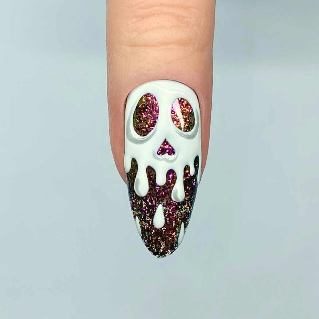 How to Create a Stunning Dripping Skull Nail Design