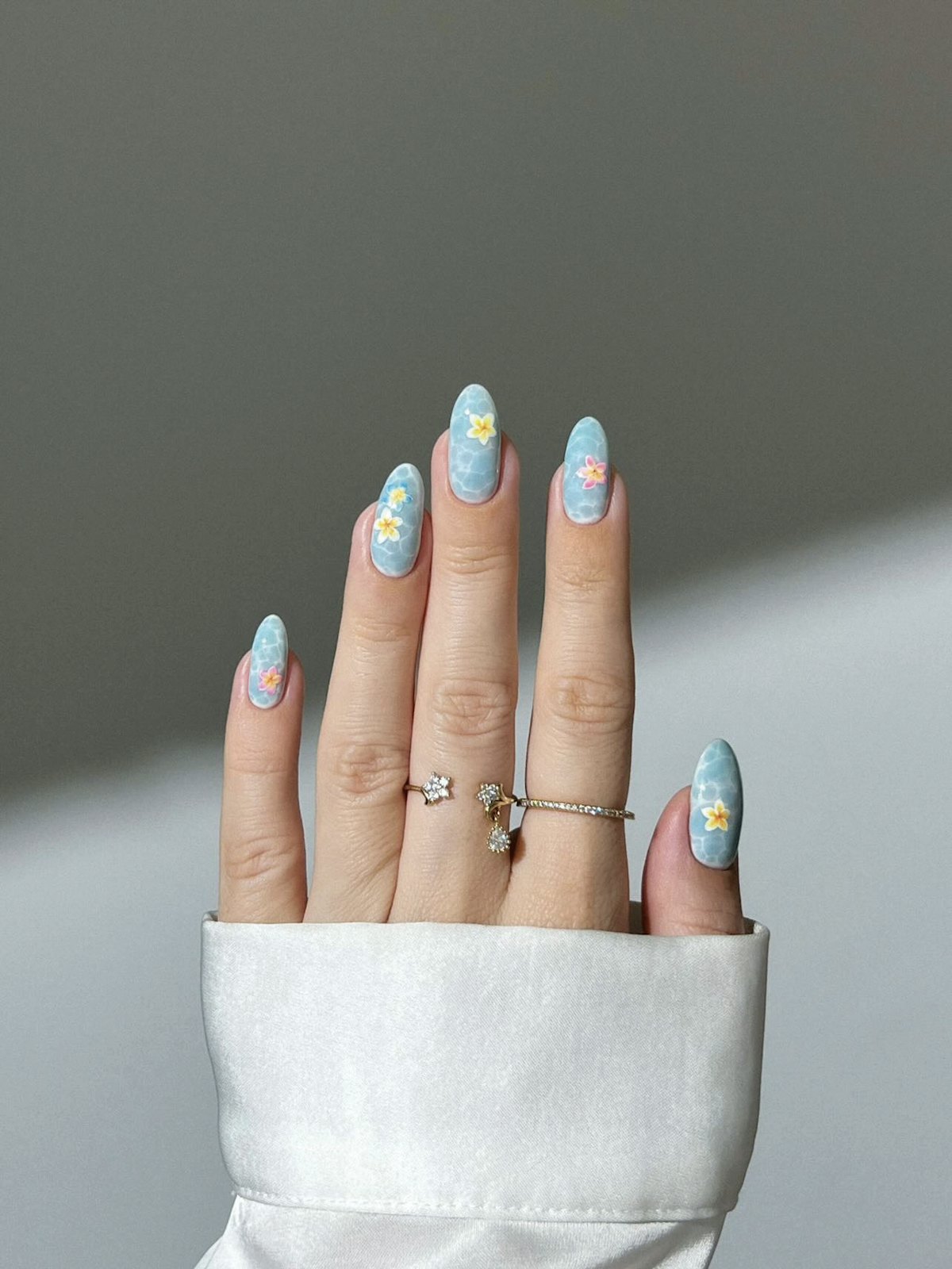 8 Beautiful Water-Inspired Nail Designs for Summer